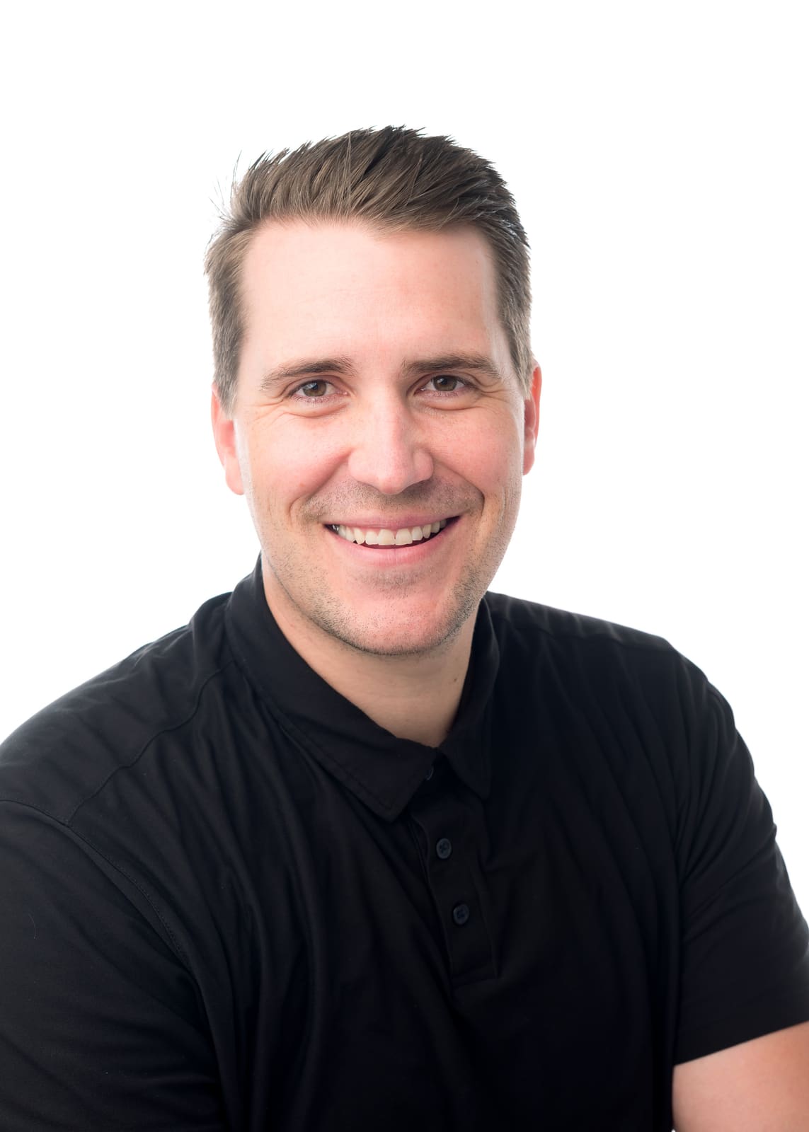 Studio headshot of Dr. Travis Kinser
